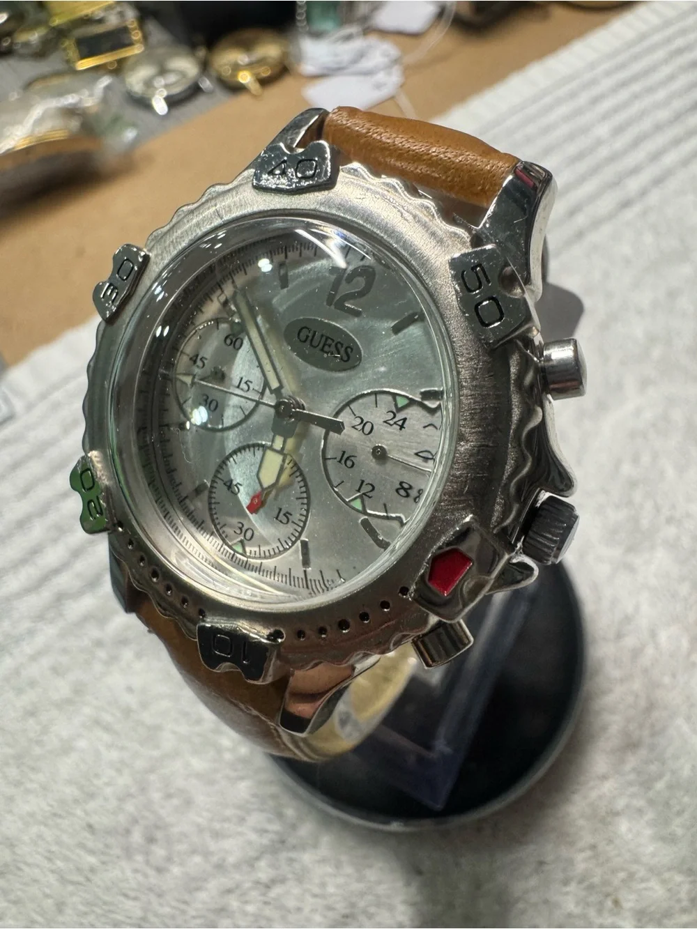 GUESS Men’s Silver Dial Chronograph Watch with Tan Leather Strap